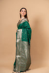 Regal Charm Bottle Green Banarsi Woven Silk Saree With Unstitched Blouse