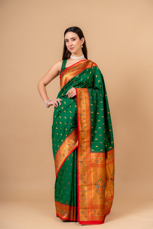 Regal Charm Bottle Green Banarasi Silk Saree With Unstitched Blouse