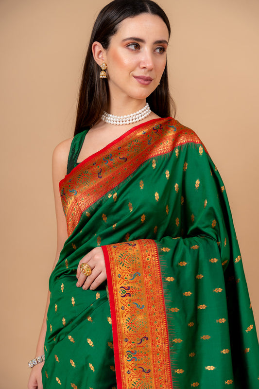 Regal Charm Bottle Green Banarasi Silk Saree With Unstitched Blouse