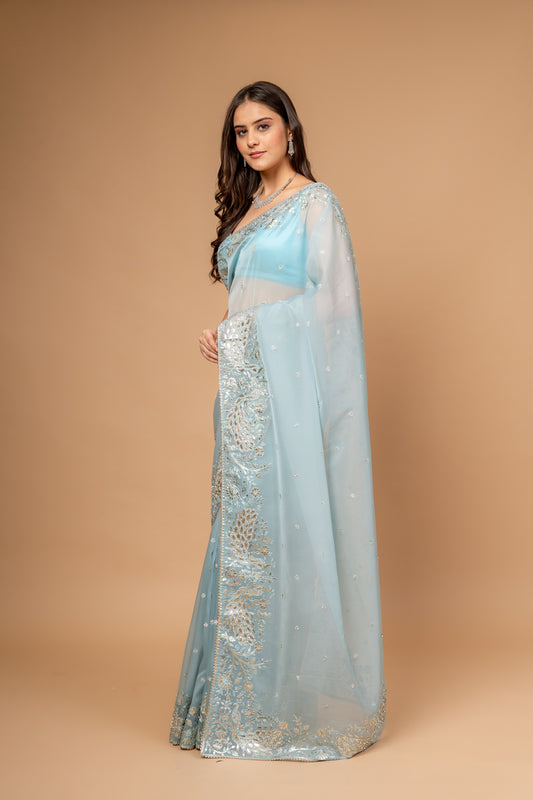 Timelessly Yours Sky Blue Organza Saree With Peacock Embroidery and Unstitched Blouse