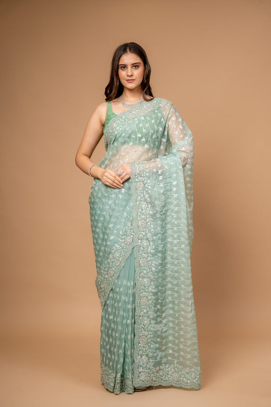 Wrapped in Elegance Pista Floral Organza Saree And Woven Zari Border With Unstitched Blouse