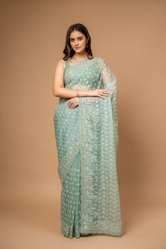 Wrapped in Elegance Pista Floral Organza Saree And Woven Zari Border With Unstitched Blouse