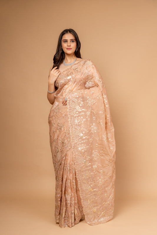 Graceful Flow Peach Organza Saree And Woven Zari Border With Unstitched Blouse