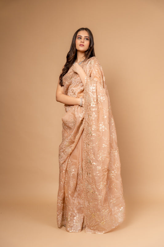 Graceful Flow Peach Organza Saree And Woven Zari Border With Unstitched Blouse