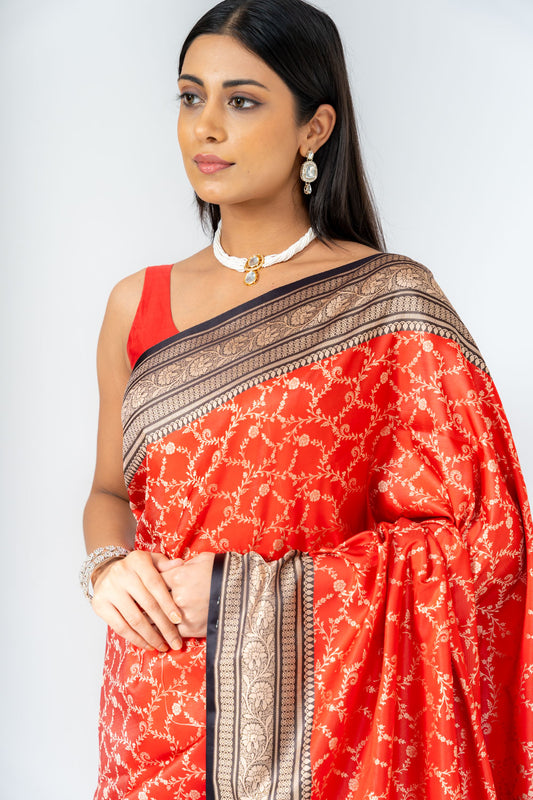 Grace Redefined Red Banarasi Silk Saree With Unstitched Blouse