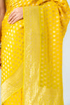 Shine Bright In Mango Gold Khaddi Georgette Saree With Unstitched Blouse