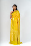 Shine Bright In Mango Gold Khaddi Georgette Saree With Unstitched Blouse