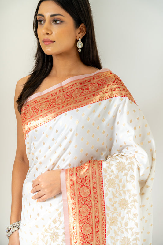 An Ode To Timeless Beauty White Red Banarasi Silk Saree With Unstitched Blouse