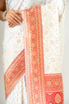 An Ode To Timeless Beauty White Red Banarasi Silk Saree With Unstitched Blouse