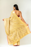 Shine Bright In Mango Gold Banarasi Silk Saree With Unstitched Blouse
