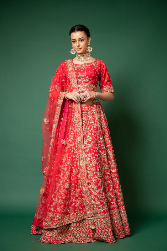 Rani Raw Silk Lehenga Set And Net Dupatta With Readymade Blouse