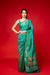 Rama Woven Zari Banarasi Silk Saree With Unstitched Blouse