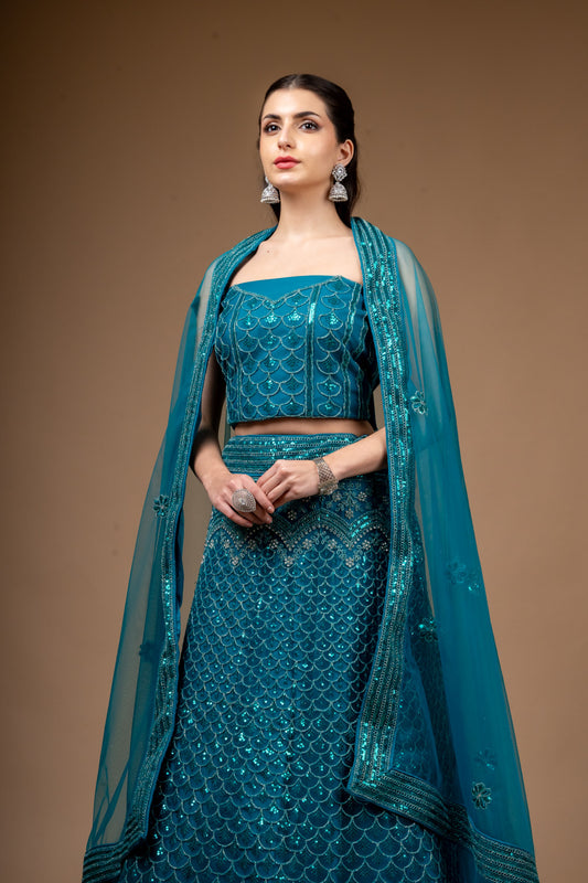 Rama Zari Threadwork & Sequence Net Lehenga Set With Unstitched Blouse