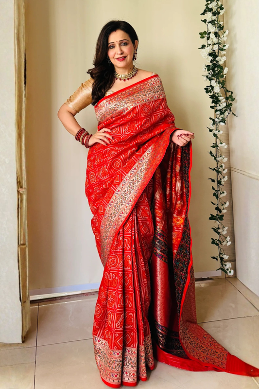 Grace Redefined Red Bandhani Gharchola Zari Border Banarasi Silk Saree With Unstitched Blouse (Ft:-Anjan Prasad)