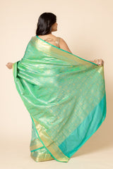 Emrl Green Banarasi Woven Zari Saree With Unstitched Blouse