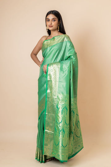 Bottle Green Kanjivaram Silk Saree With Unstitched Blouse