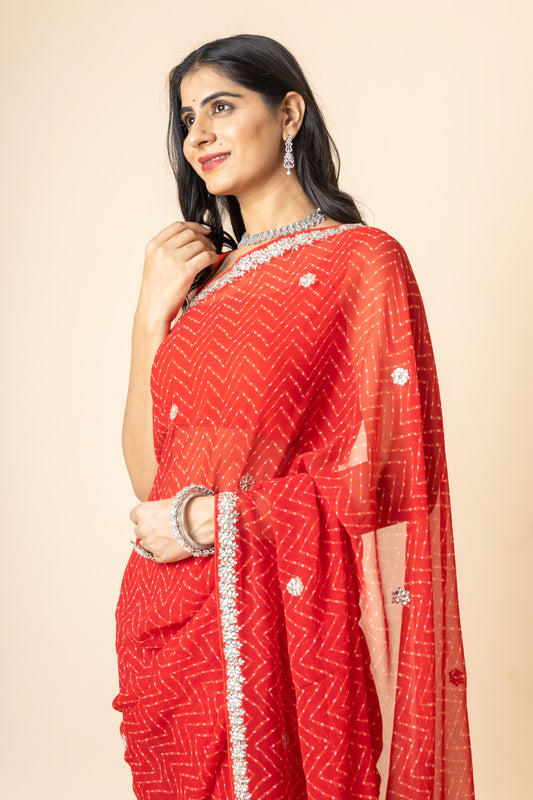 Red Georgette Swarovski Saree With Leheriya Print With Unstitched Blouse