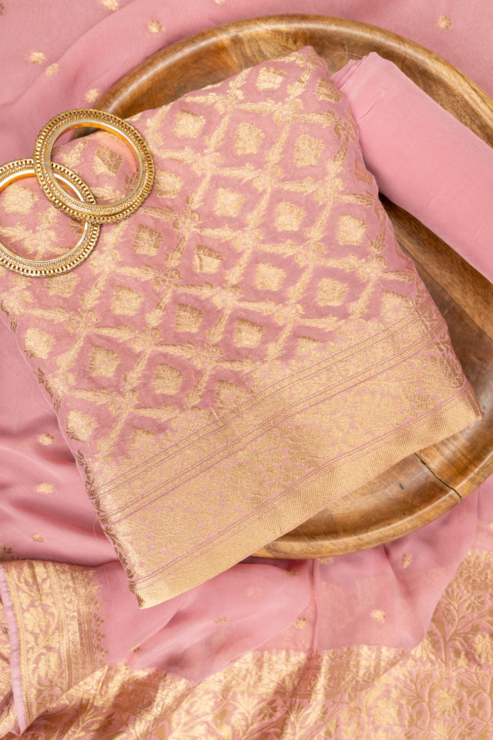 Gajari Khaddi Georgette Unstitched Suit And Dupatta With Banarasi Woven Zari