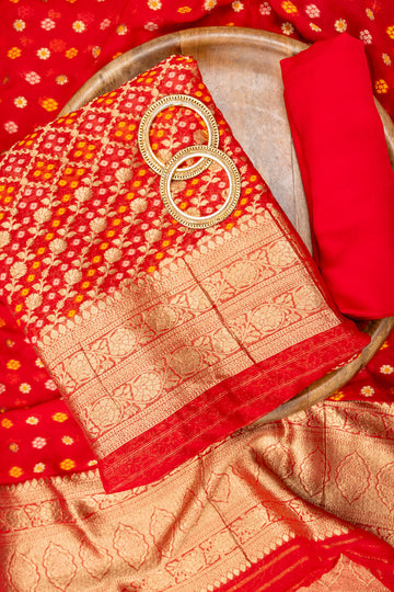 Red Khaddi Georgette Unstitched Suit And Dupatta With Banarasi Woven Zari