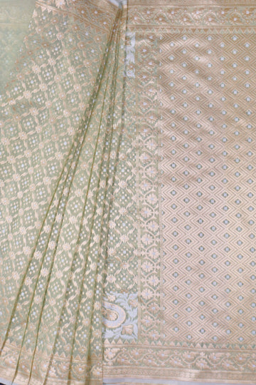 Pista Organza Woven Saree With Unstitched Blouse