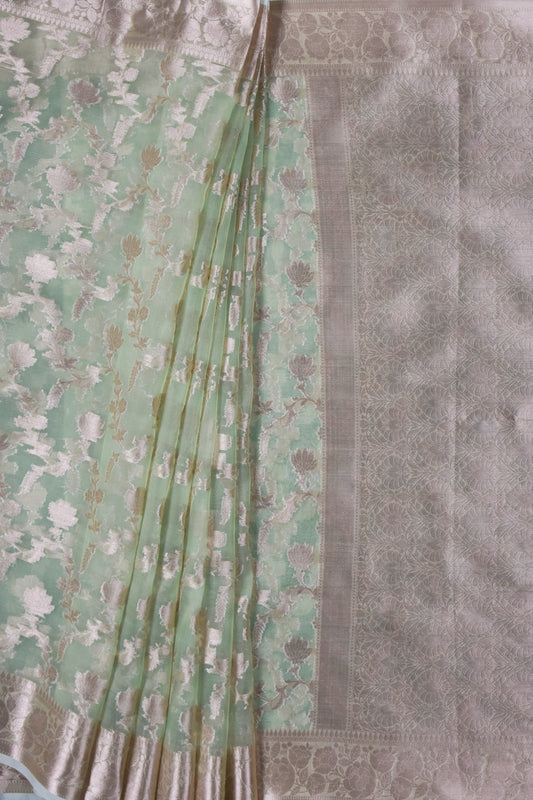 Pista Organza Woven Saree With Unstitched Blouse