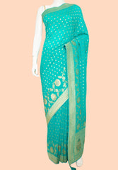 Rama Khaddi Georgette Woven Saree With Unstitched Blouse