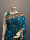 Rama Crepe Embroidered Saree With Unstitched Blouse