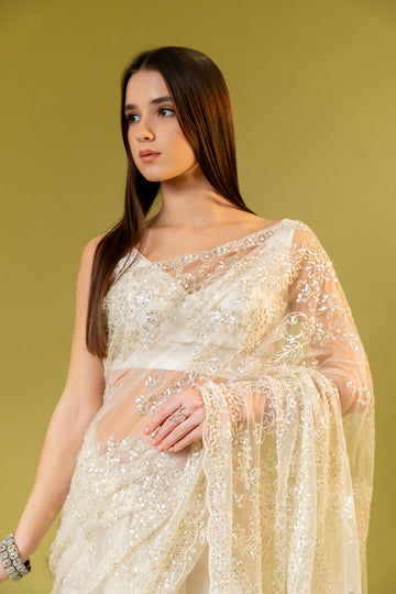 Off White Net Embroidered Saree With Unstitched Blouse