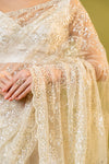 Off White Net Embroidered Saree With Unstitched Blouse