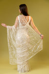 Off White Net Embroidered Saree With Unstitched Blouse
