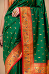 Regal Charm Bottle Green Banarasi Silk Saree With Unstitched Blouse