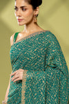 Rama Georgette Embroidered Saree With Unstitched Blouse
