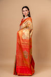 Grace Redefined Red Banarasi Saree With Floral Patterns And Zari Border With Unstitched Blouse
