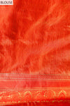 Grace Redefined Red Banarasi Saree With Floral Patterns And Zari Border With Unstitched Blouse
