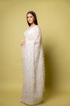 Effortlessly Beautiful Off White Organza Jaal Print Saree With Unstitched Blouse