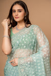 Wrapped in Elegance Pista Floral Organza Saree And Woven Zari Border With Unstitched Blouse