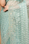 Wrapped in Elegance Pista Floral Organza Saree And Woven Zari Border With Unstitched Blouse