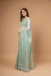 Wrapped in Elegance Pista Floral Organza Saree And Woven Zari Border With Unstitched Blouse