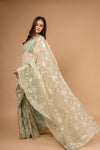 Wrapped in Elegance Pista Organza Saree And Woven Zari Border With Unstitched Blouse