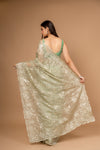 Wrapped in Elegance Pista Organza Saree And Woven Zari Border With Unstitched Blouse