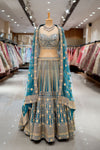 MEHENDI Rama Raw Silk Lehenga Set And Net Dupatta With Readymade Blouse