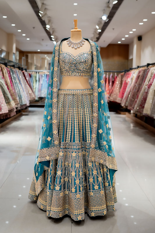MEHENDI Rama Raw Silk Lehenga Set And Net Dupatta With Readymade Blouse