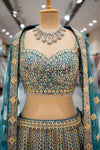 MEHENDI Rama Raw Silk Lehenga Set And Net Dupatta With Readymade Blouse