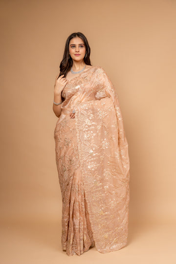 Graceful Flow Peach Organza Saree And Woven Zari Border With Unstitched Blouse