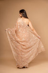 Graceful Flow Peach Organza Saree And Woven Zari Border With Unstitched Blouse