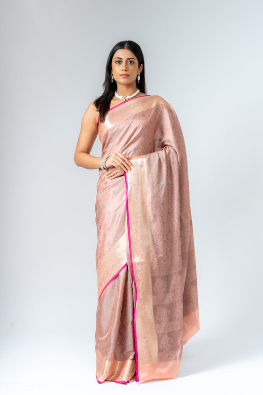 Graceful Flow Peach Banarasi Silk Saree With Unstitched Blouse