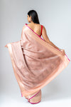 Graceful Flow Peach Banarasi Silk Saree With Unstitched Blouse