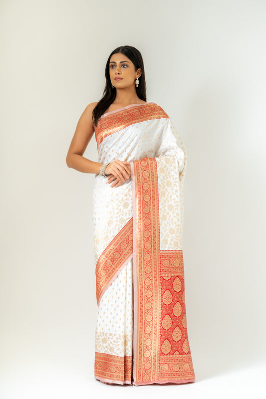 An Ode To Timeless Beauty White Red Banarasi Silk Saree With Unstitched Blouse