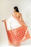 An Ode To Timeless Beauty White Red Banarasi Silk Saree With Unstitched Blouse