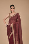 Garnet Sequence & Zari Work Georgette Saree With Unstitched Blouse